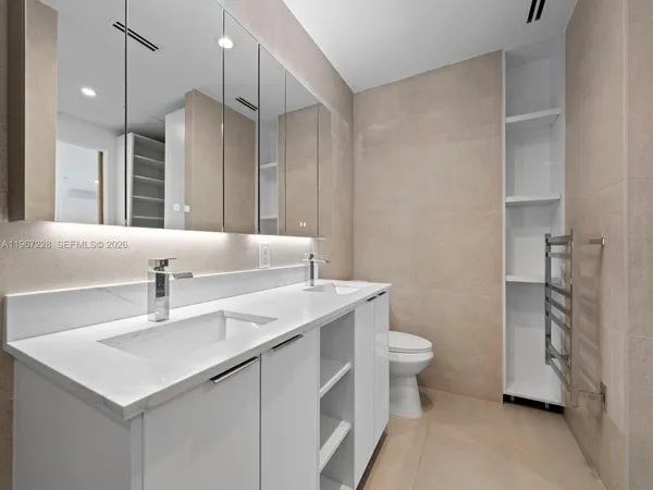 a bathroom with a sink and a toilet