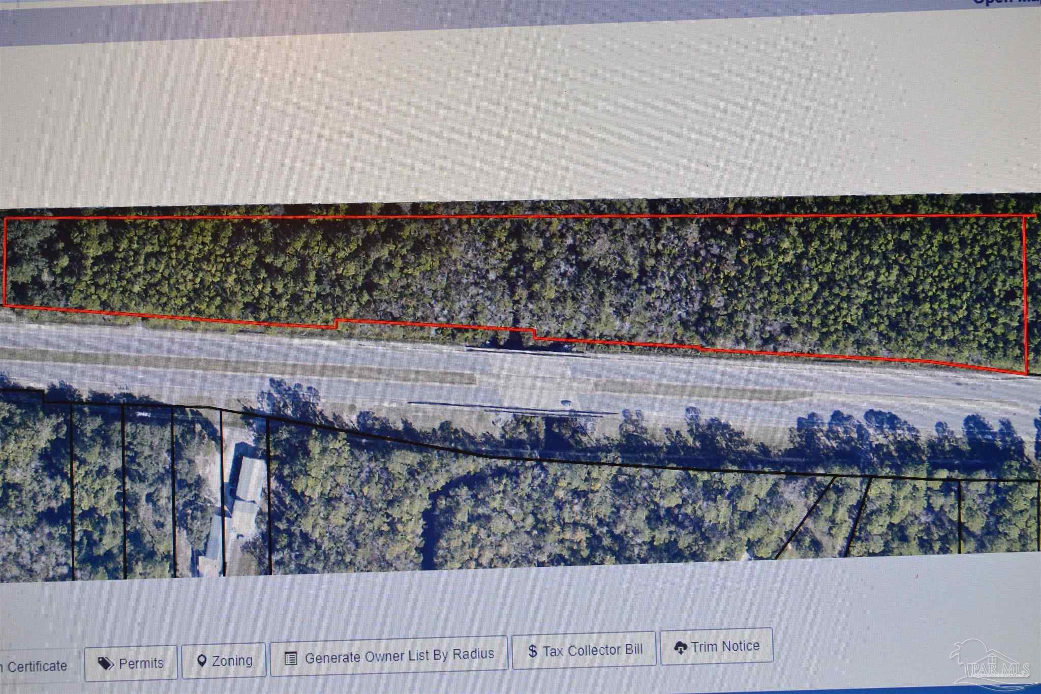 87 Navarre Navarre, FL 32566 - Photo 2 of 4 a view of a garden