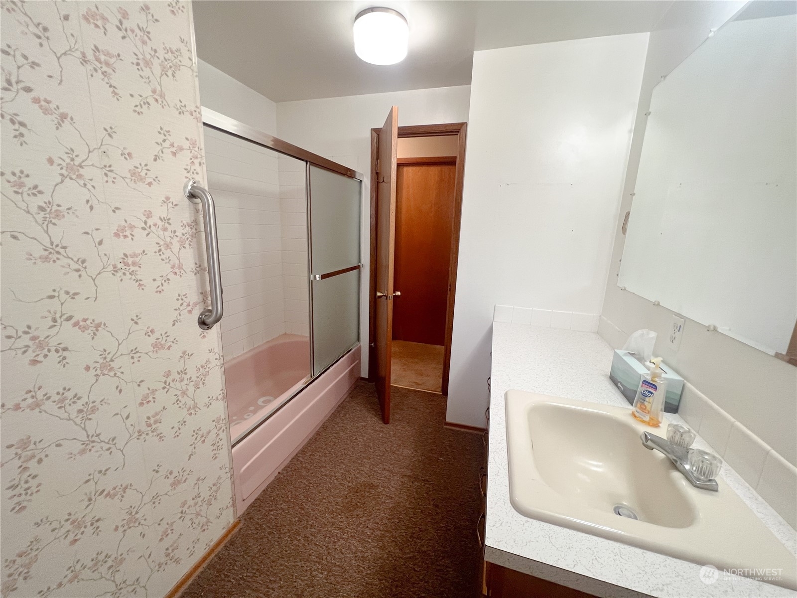 116 Silver Drive Electric City, WA 99123 - Photo 17 of 27 a bathroom with a sink and a mirror