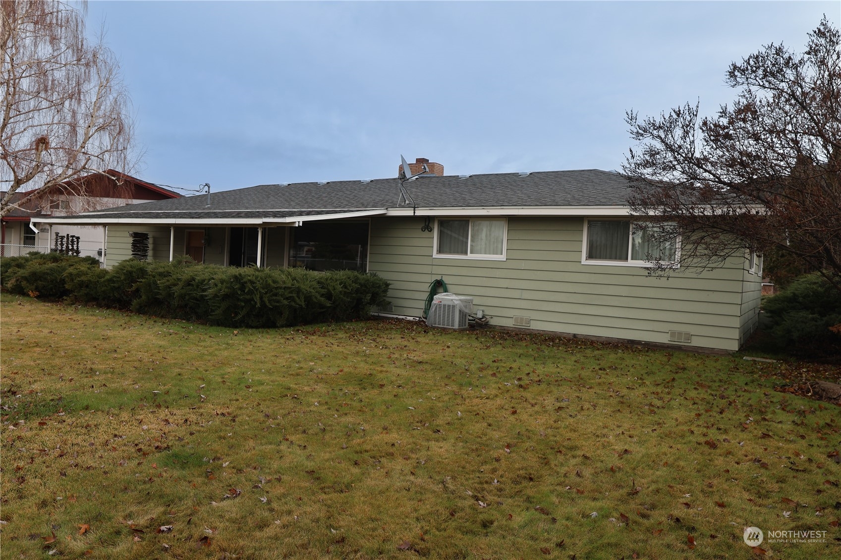116 Silver Drive Electric City, WA 99123 - Photo 24 of 27 a front view of a house with garden