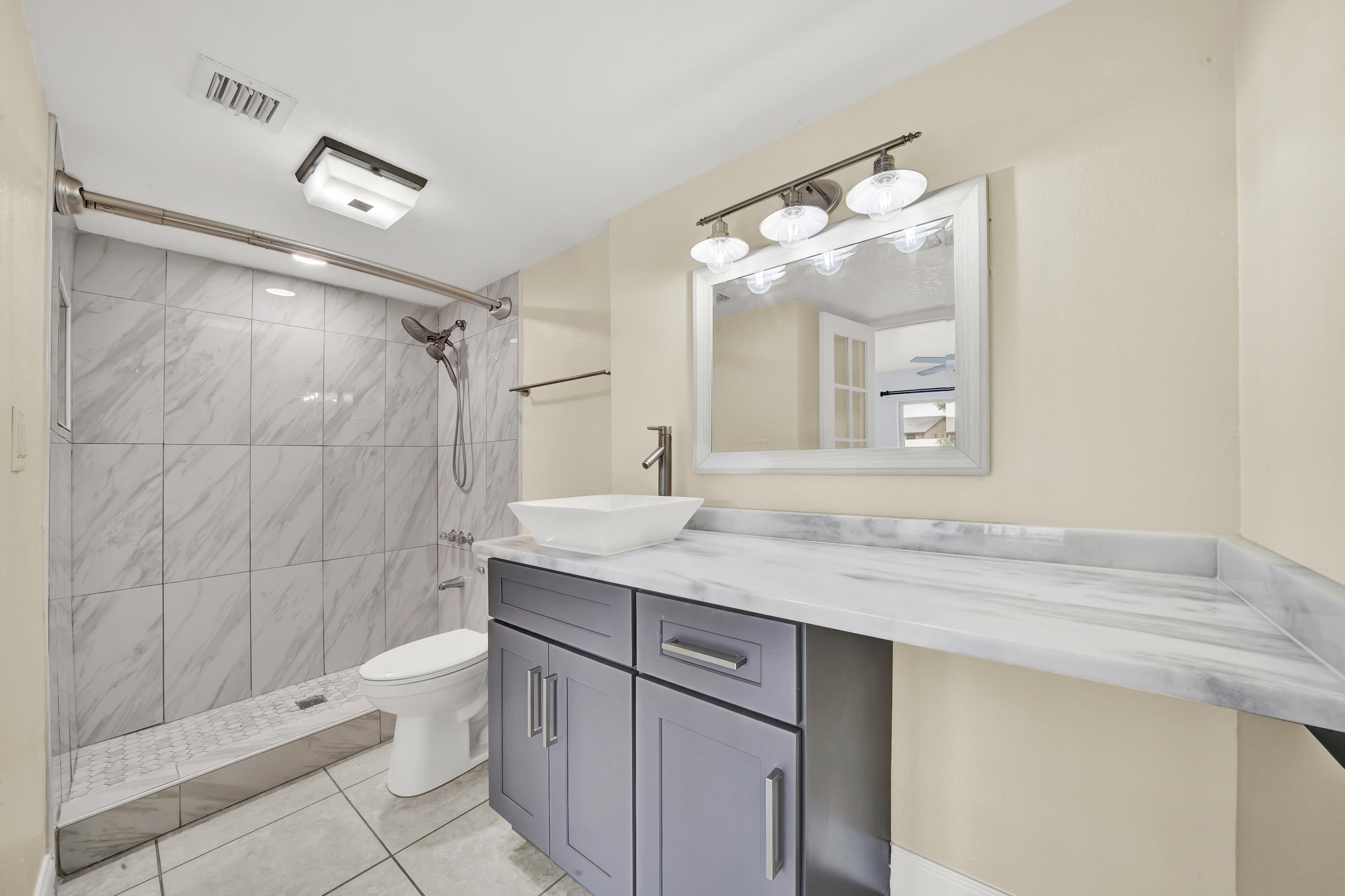 3905 North Nob Hill Road, Unit 105 Sunrise, FL 33351 - Photo 12 of 16 Master Bathroom (3)