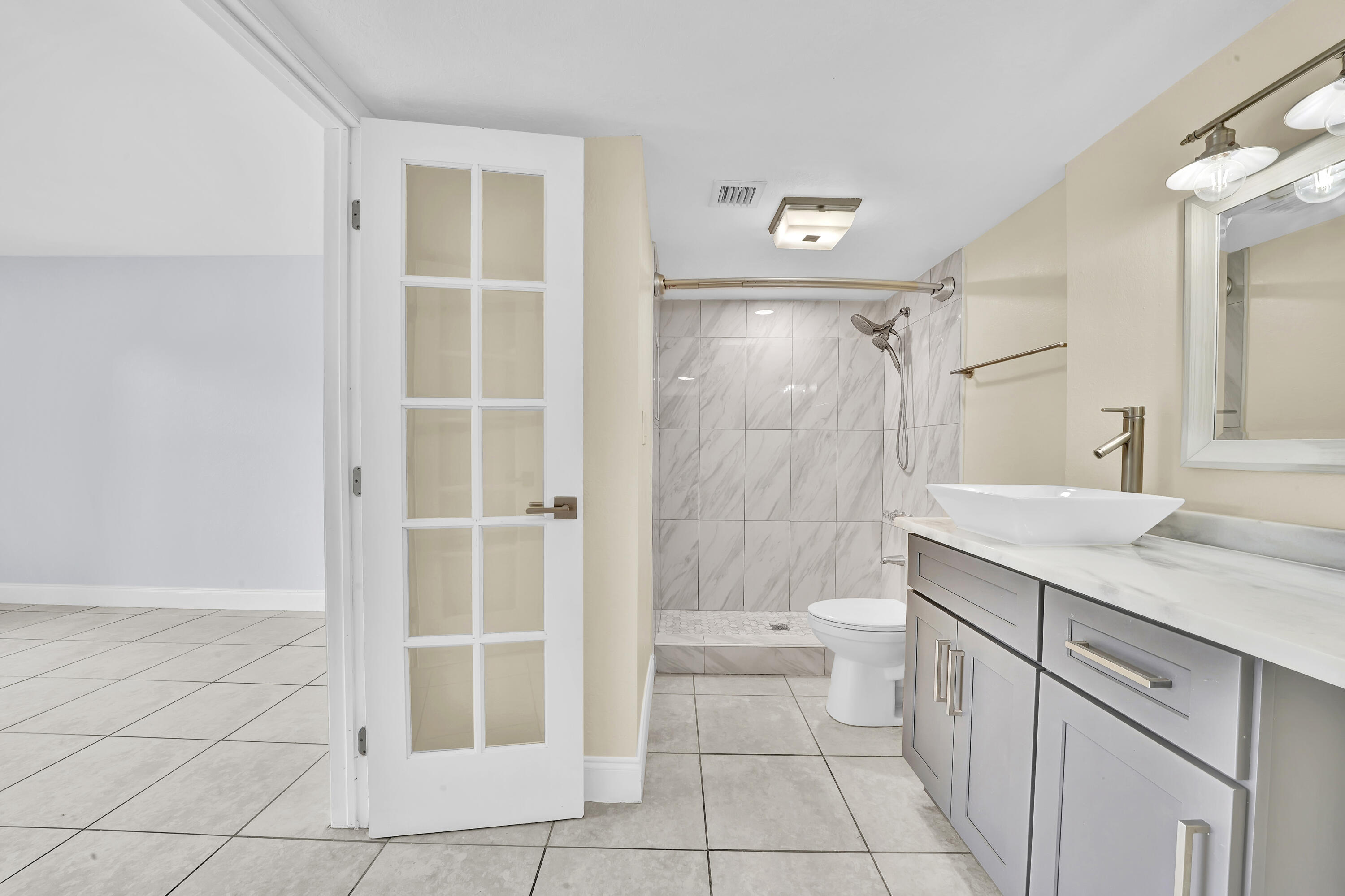 3905 North Nob Hill Road, Unit 105 Sunrise, FL 33351 - Photo 15 of 16 Master Bathroom (2)