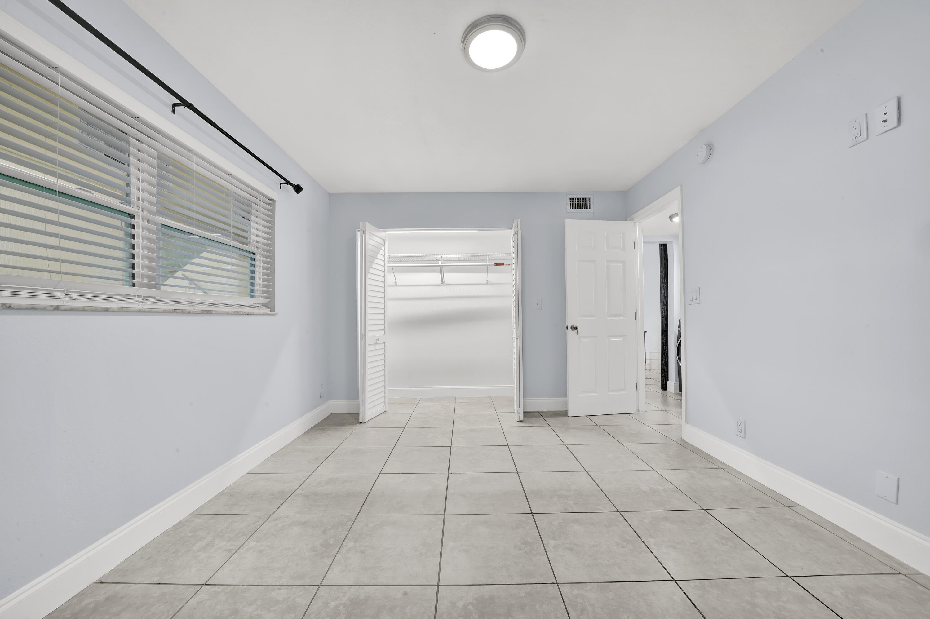 3905 North Nob Hill Road, Unit 105 Sunrise, FL 33351 - Photo 16 of 16 Guest Bedroom (1)
