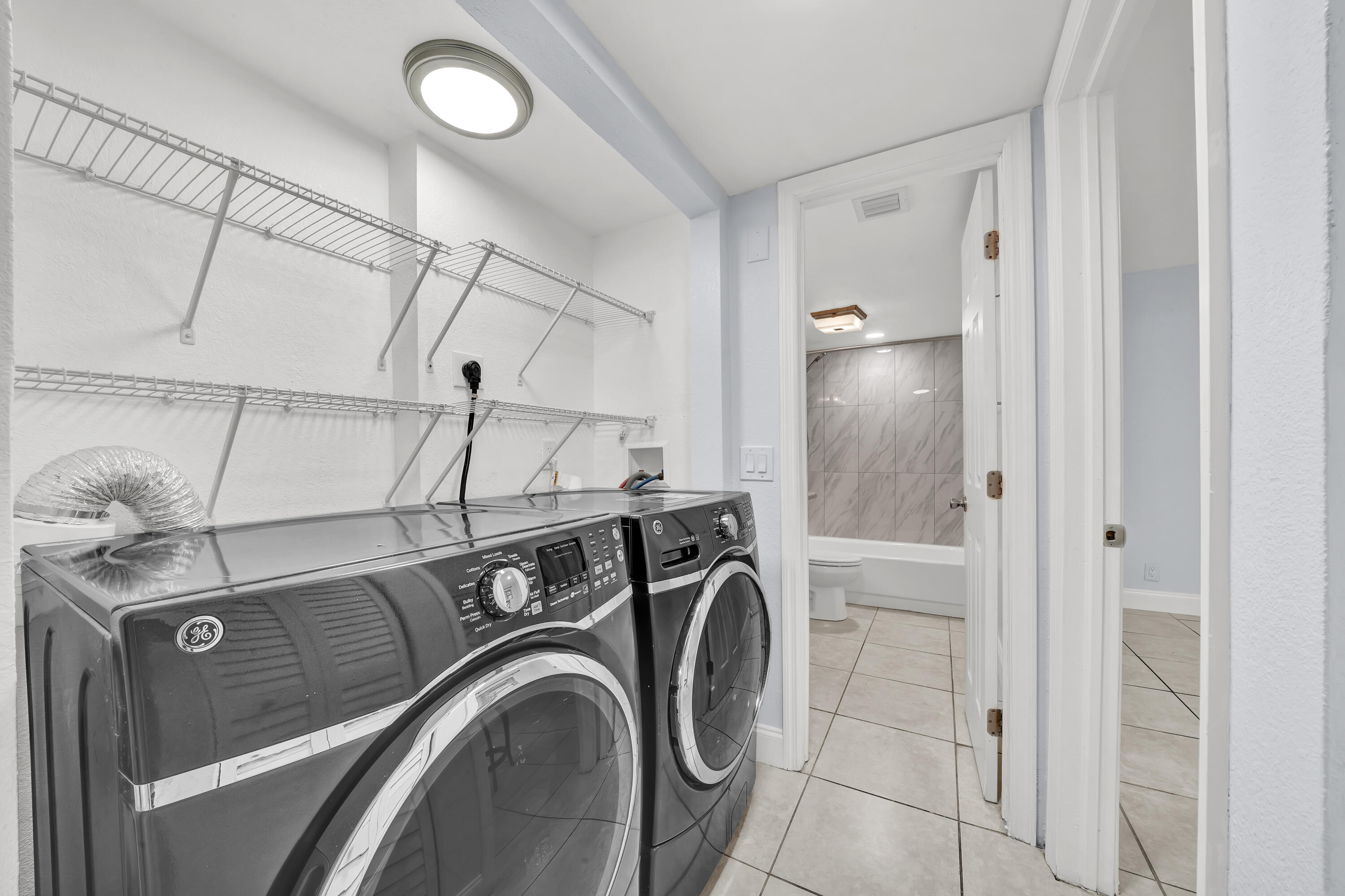 3905 North Nob Hill Road, Unit 105 Sunrise, FL 33351 - Photo 8 of 16 Laundry Area