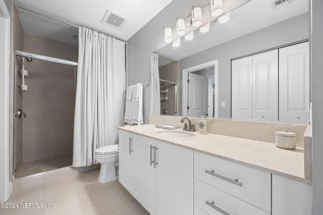 a view of a glass door with a balcony