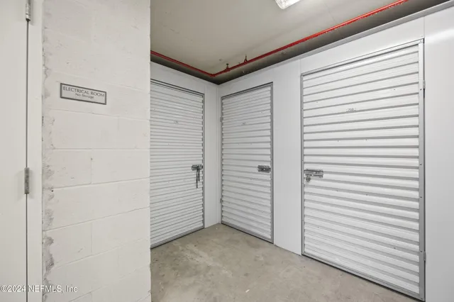 a kitchen with stainless steel appliances granite countertop a stove and cabinets