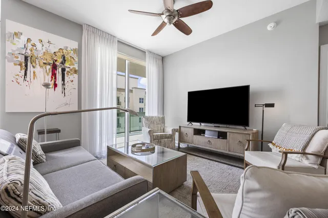 a bathroom with a double vanity sink toilet and shower