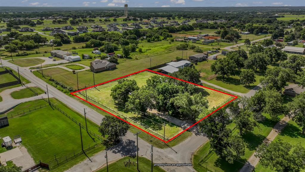 111 Quail Drive Springtown, TX 76082 - Photo 19 of 22 an aerial view of a residential houses with outdoor space and garden