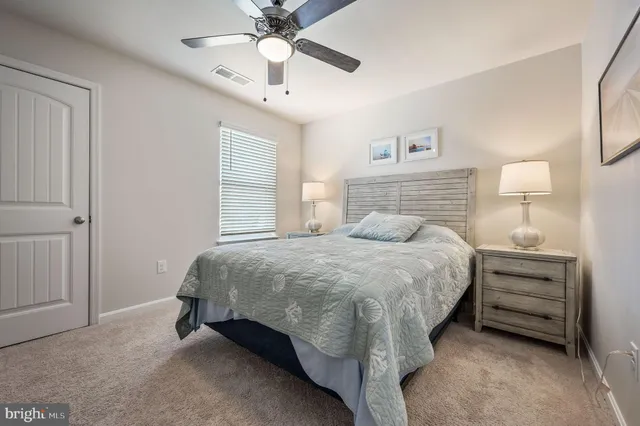 a bedroom with a bed and closet