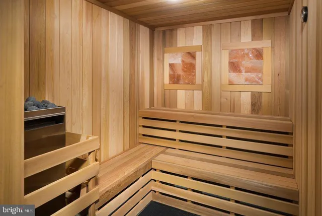 a view of wooden floor and windows in a room