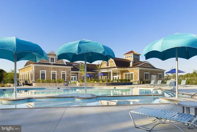 front view of house with a swimming pool