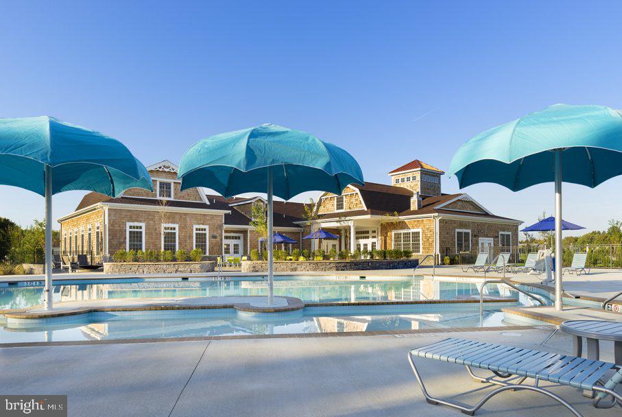 34318 Gooseberry Avenue Ocean View, DE 19970 - Photo 30 of 32 front view of house with a swimming pool
