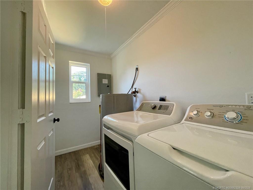 2346 Northeast Rustic Place Jensen Beach, FL 34957 - Photo 15 of 18 a utility room with dryer and washer