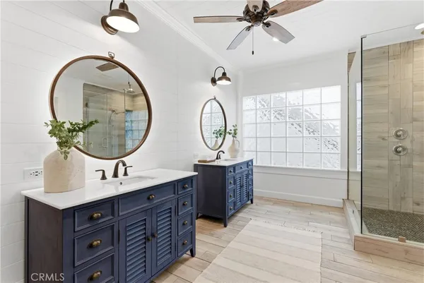 a view of walk in closet and bedroom