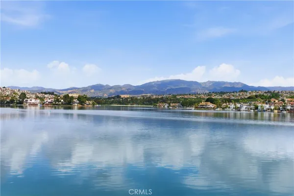 a view of a lake with a city
