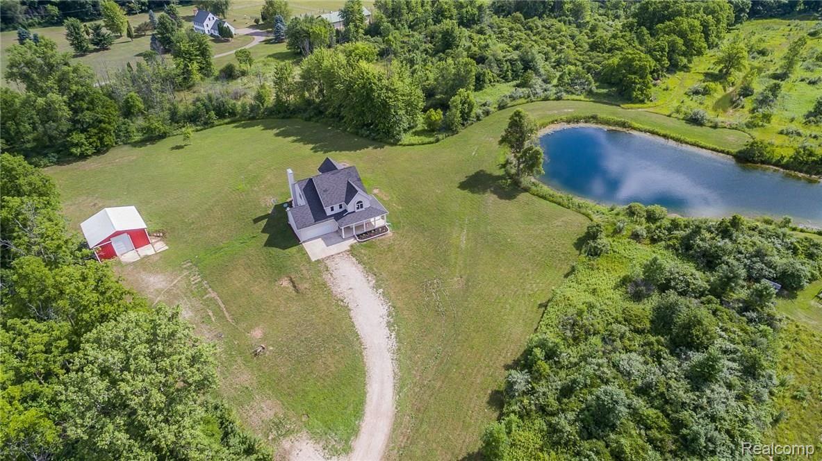 6464 North Fowlerville Road Fowlerville, MI 48836 - Photo 38 of 70 DJI_0066.jpg