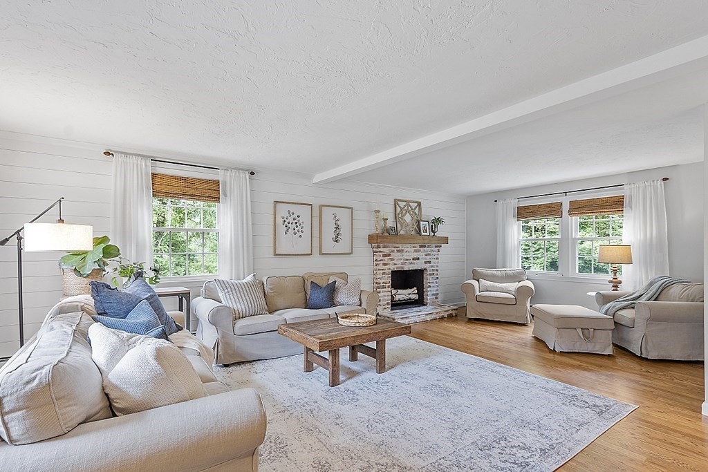 27 Tanglewood Road Sterling, MA 01564 - Photo 13 of 38 a living room with furniture and a fireplace