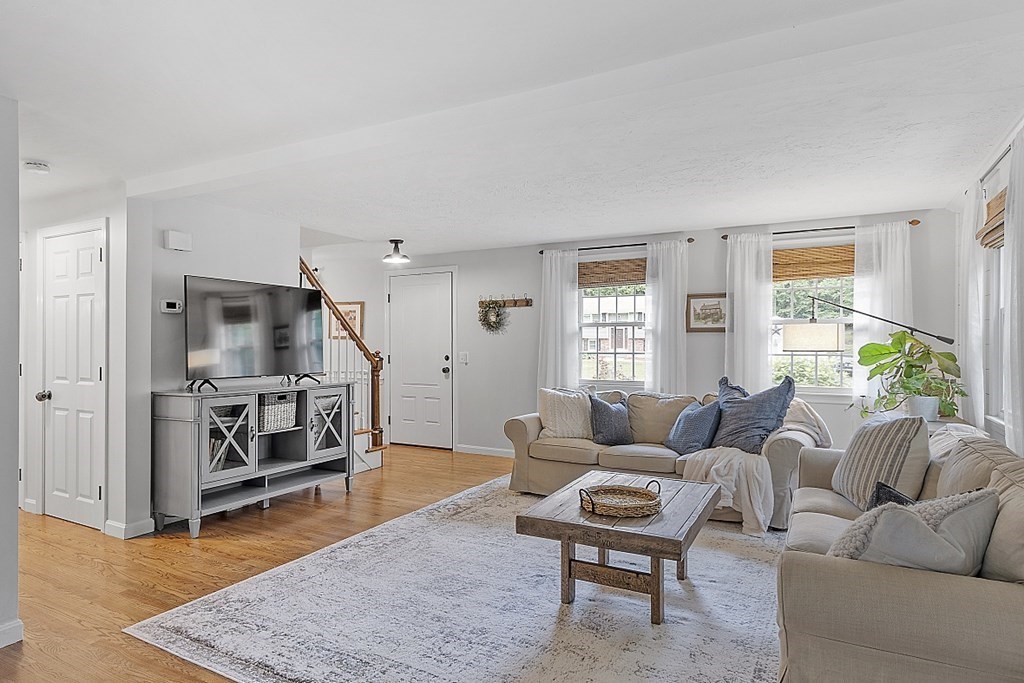 27 Tanglewood Road Sterling, MA 01564 - Photo 15 of 38 a living room with furniture and a flat screen tv