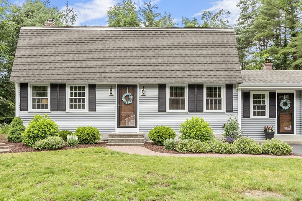 27 Tanglewood Road Sterling, MA 01564 - Photo 2 of 38 a front view of a house with a yard