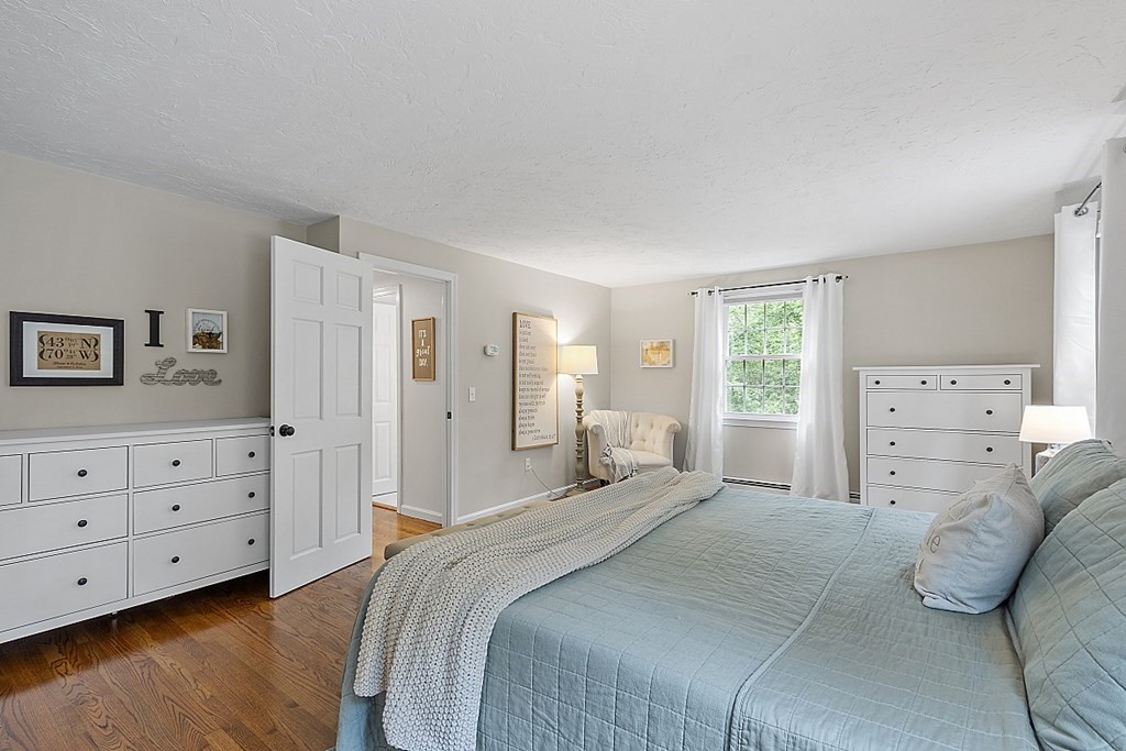 27 Tanglewood Road Sterling, MA 01564 - Photo 23 of 38 a bedroom with a bed and a dresser