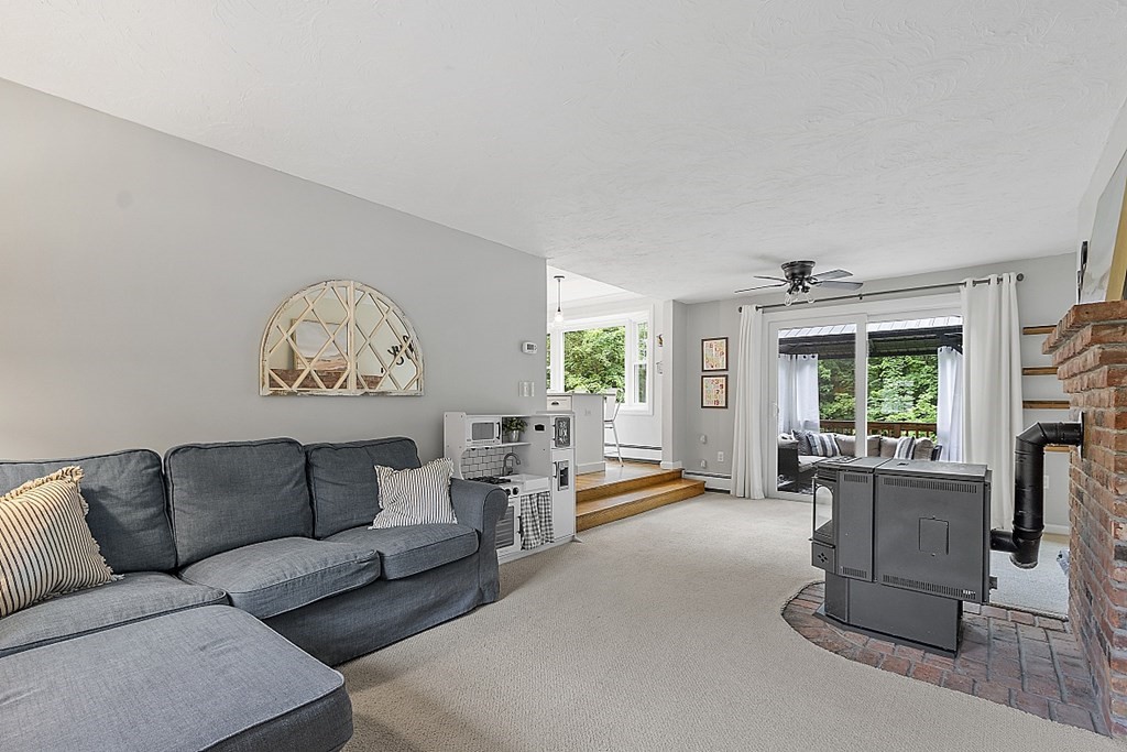 27 Tanglewood Road Sterling, MA 01564 - Photo 3 of 38 a living room with furniture and a large window