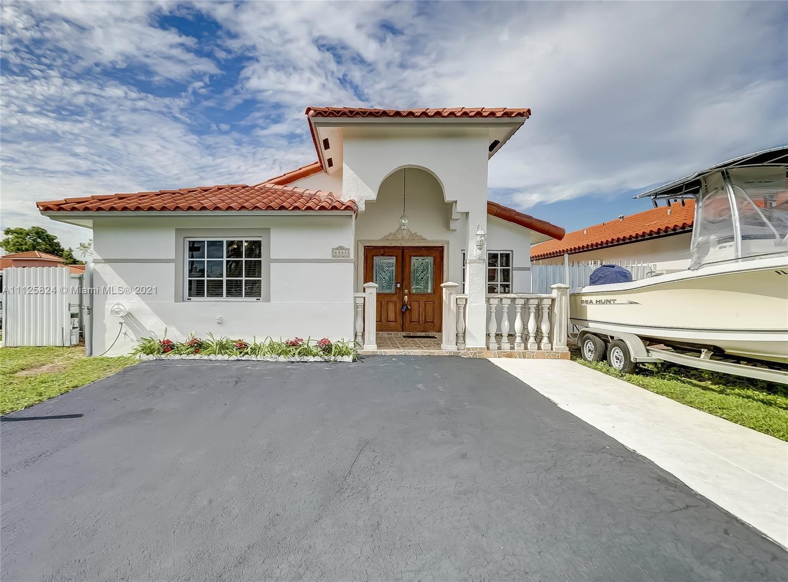 front view of a house with a street