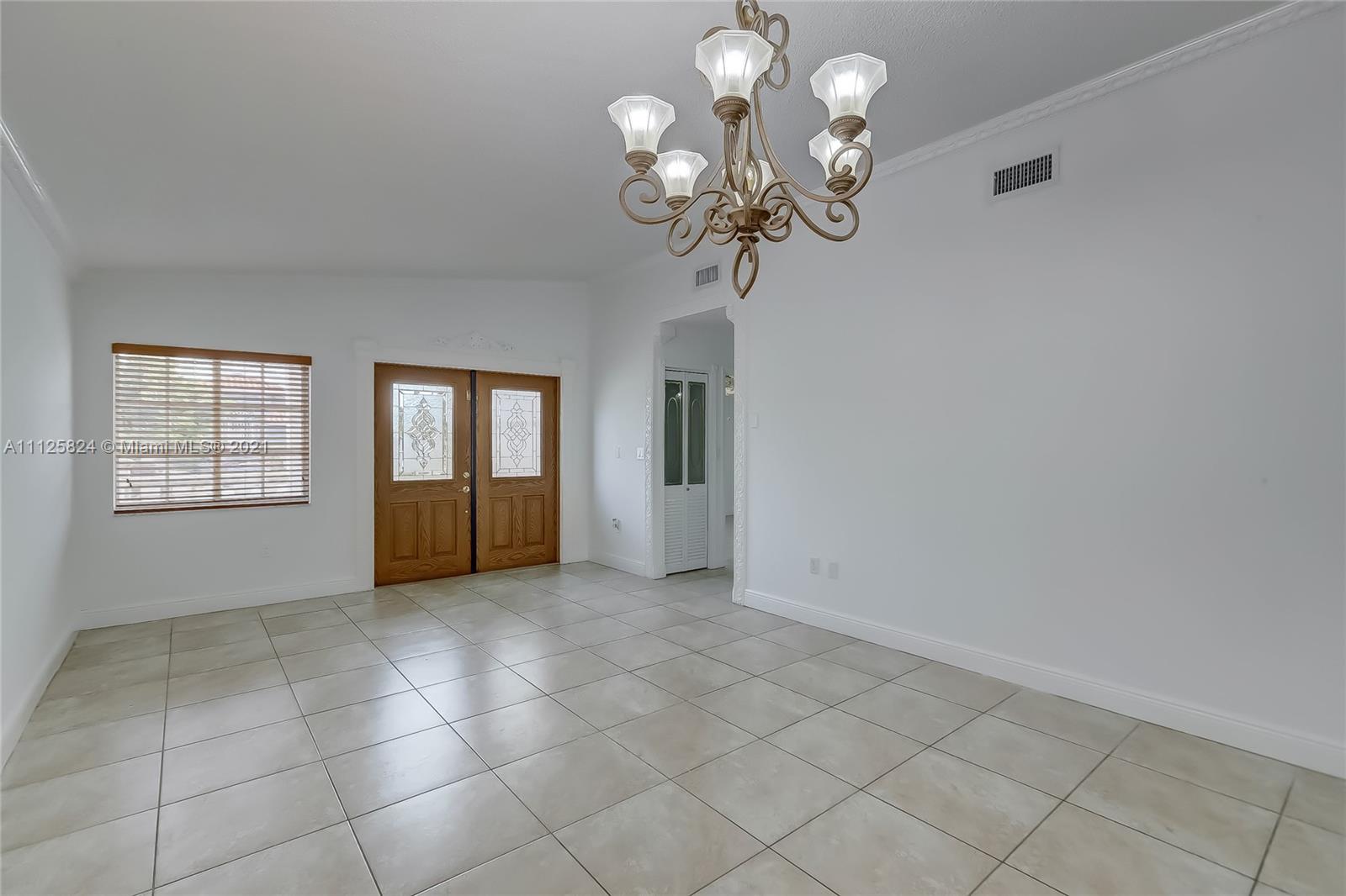 6858 West 30th Lane Hialeah, FL 33018 - Photo 7 of 37 a view of livingroom with window