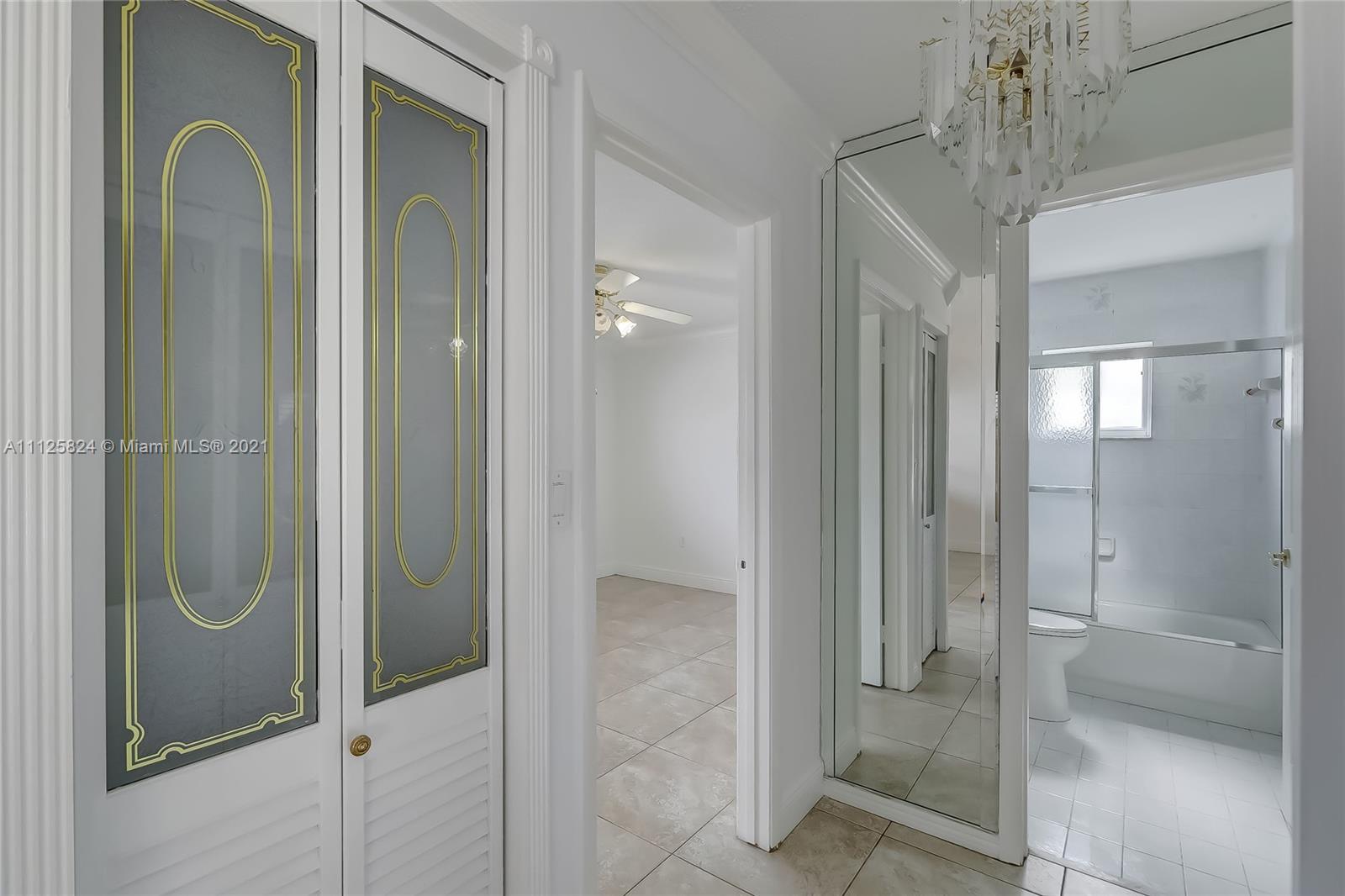 6858 West 30th Lane Hialeah, FL 33018 - Photo 9 of 37 a bathroom with a shower