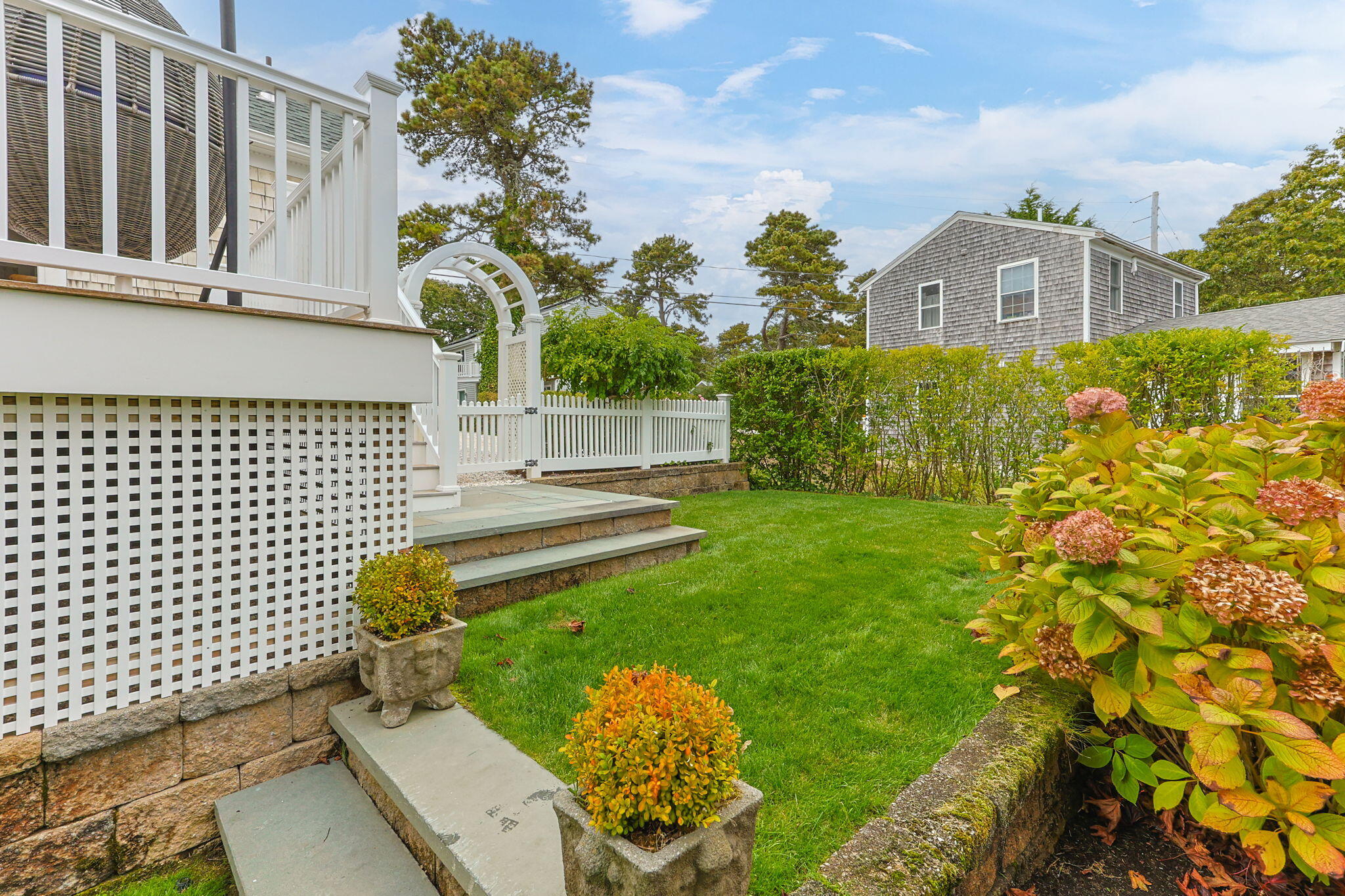 291 Ridgevale Road Chatham, MA 02633 - Photo 16 of 53 a front view of a house with a garden