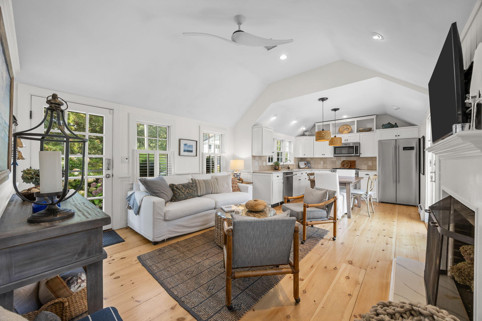 291 Ridgevale Road Chatham, MA 02633 - Photo 20 of 53 a living room with lots of furniture and a flat screen tv