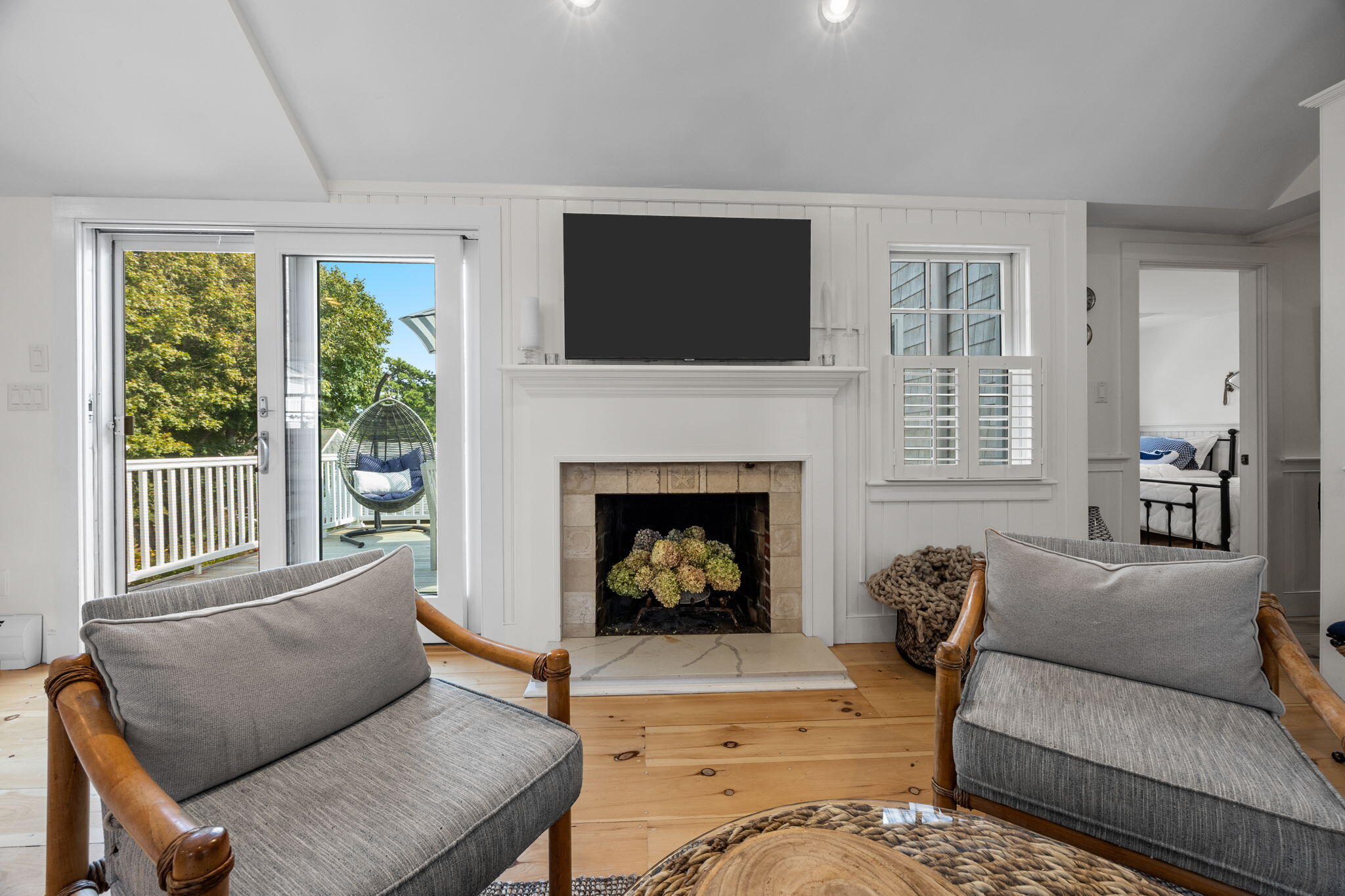 291 Ridgevale Road Chatham, MA 02633 - Photo 25 of 53 a living room with furniture fireplace and window
