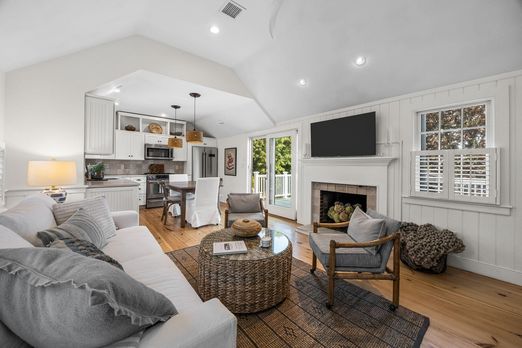 291 Ridgevale Road Chatham, MA 02633 - Photo 26 of 53 a living room with furniture fireplace and a television