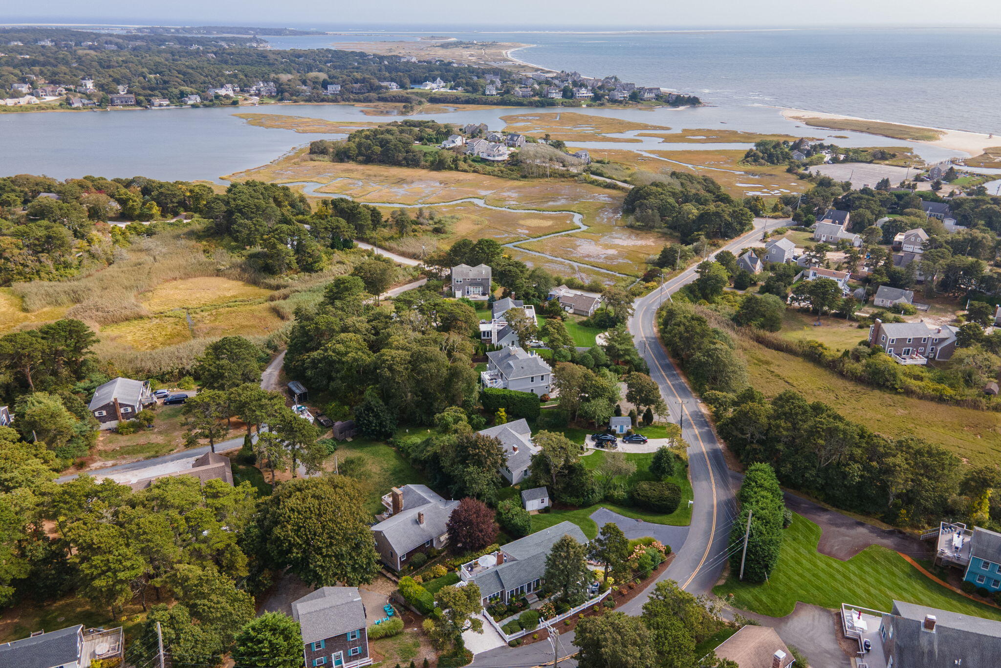 291 Ridgevale Road Chatham, MA 02633 - Photo 3 of 53 an aerial view of ocean and residential houses with outdoor space