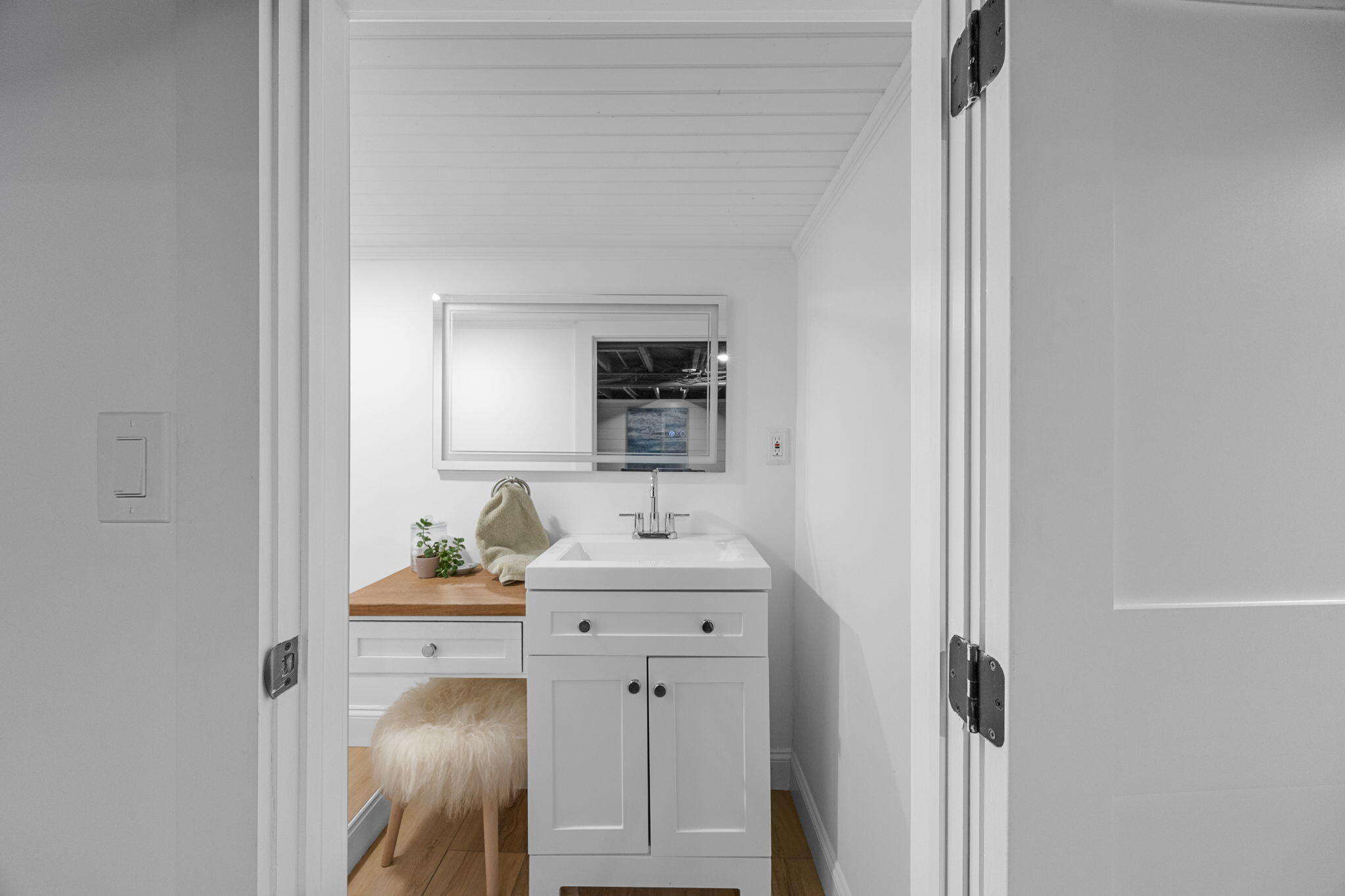 291 Ridgevale Road Chatham, MA 02633 - Photo 47 of 53 a bathroom with a sink and a mirror