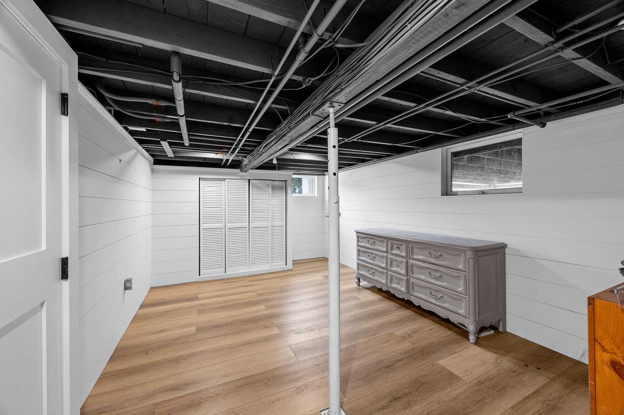 291 Ridgevale Road Chatham, MA 02633 - Photo 48 of 53 a view of an empty room with wooden floor