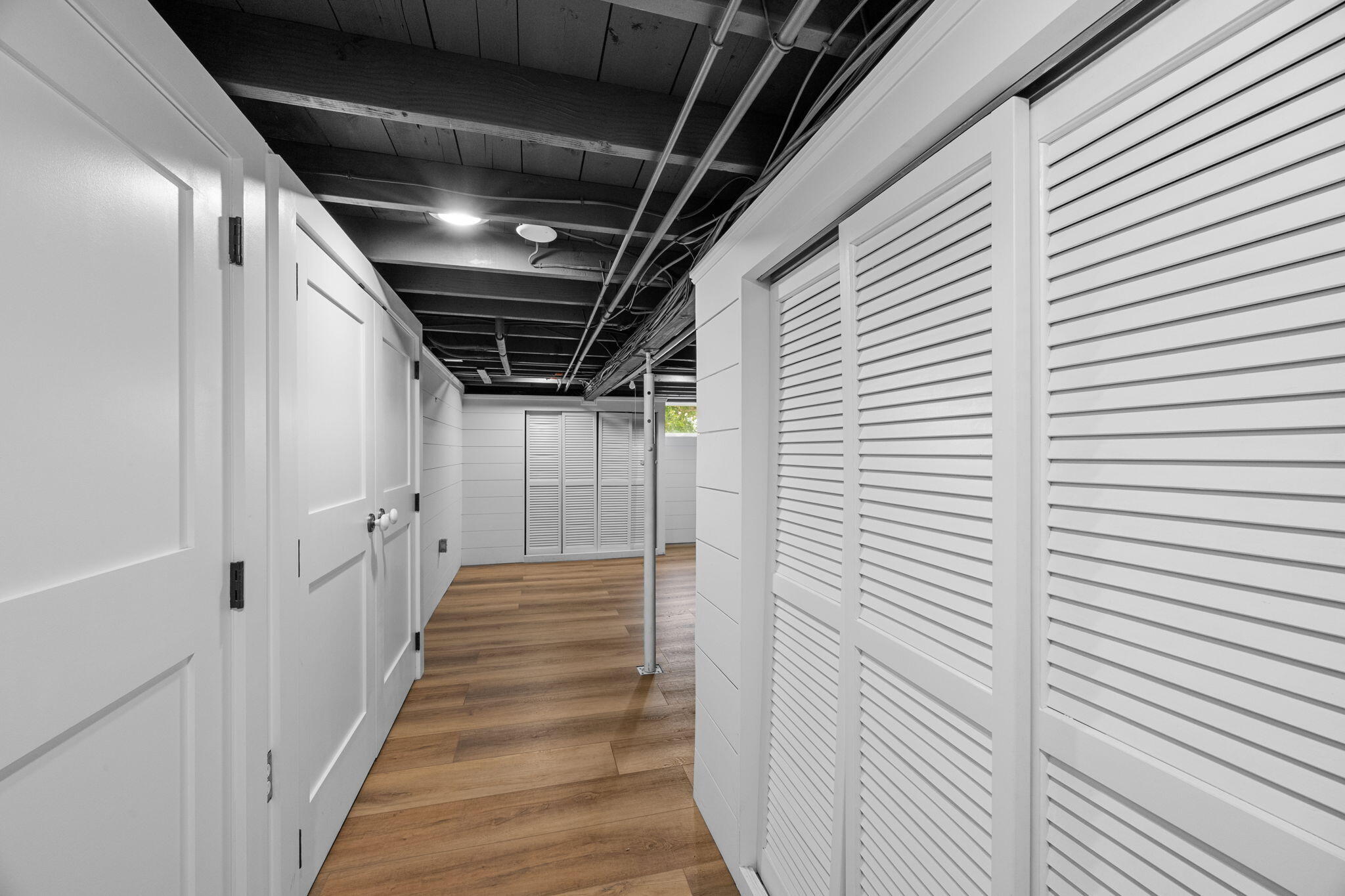 291 Ridgevale Road Chatham, MA 02633 - Photo 50 of 53 a view of a hallway with wooden floor