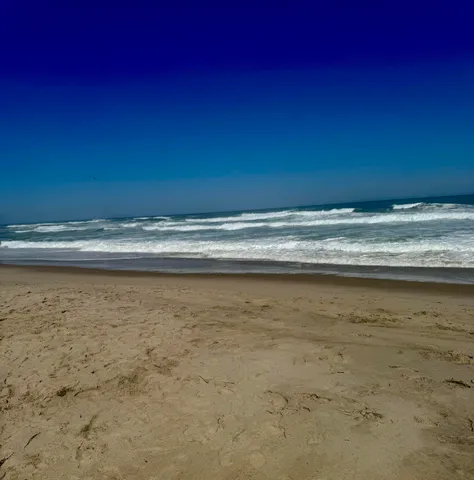 a view of a room with a fireplace