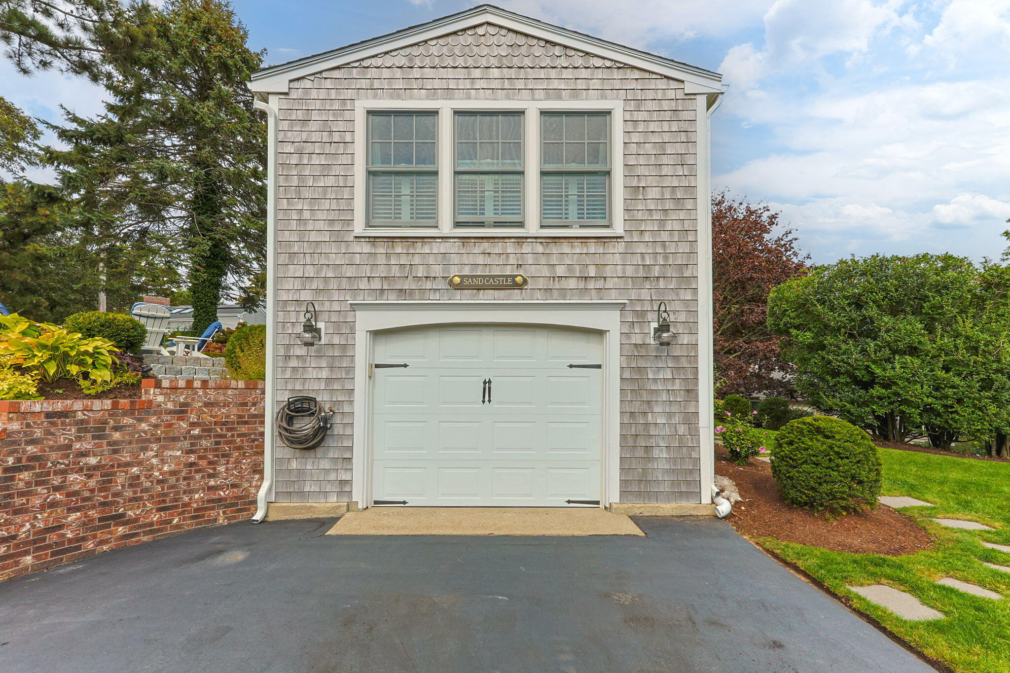 291 Ridgevale Road Chatham, MA 02633 - Photo 51 of 53 front view of a house with a yard and garage