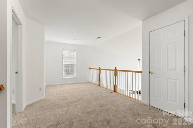 a view of a room with stairs