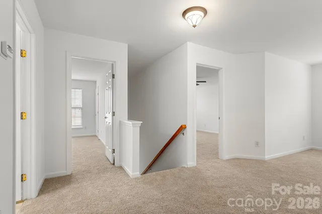 a view of a hallway with closet