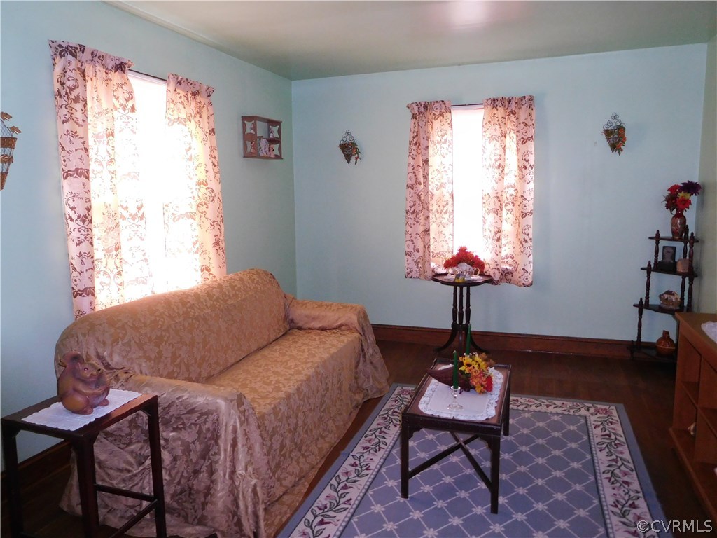 11824 Ivey Mill Road Chesterfield, VA 23838 - Photo 8 of 17 a living room with furniture and a window