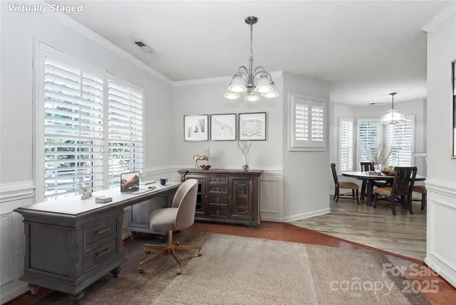 a view of a dining room with furniture
