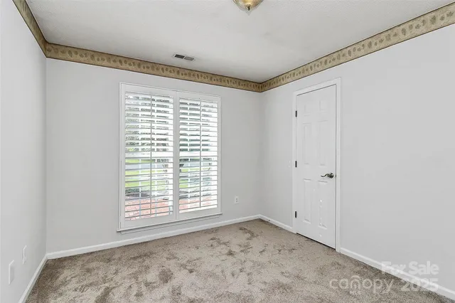 a view of a room with a window