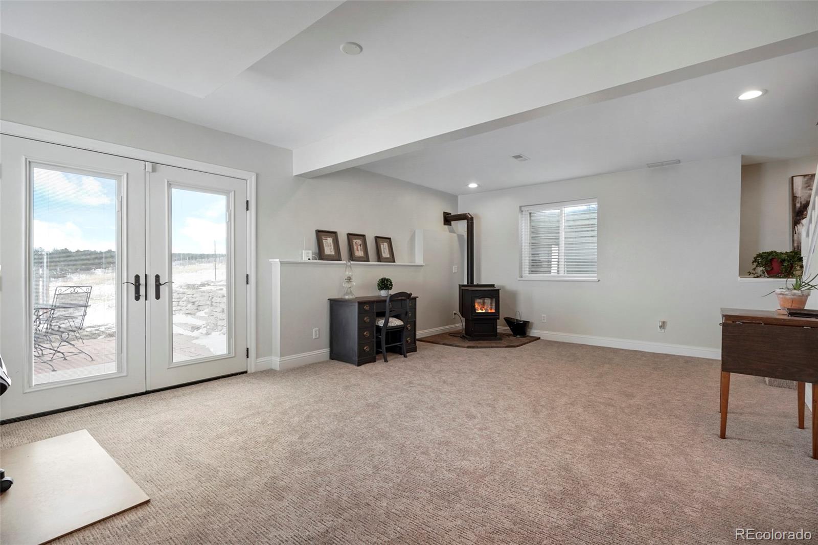 14929 South Spring Valley Road Larkspur, CO 80118 - Photo 26 of 40 a view of an empty room with a window