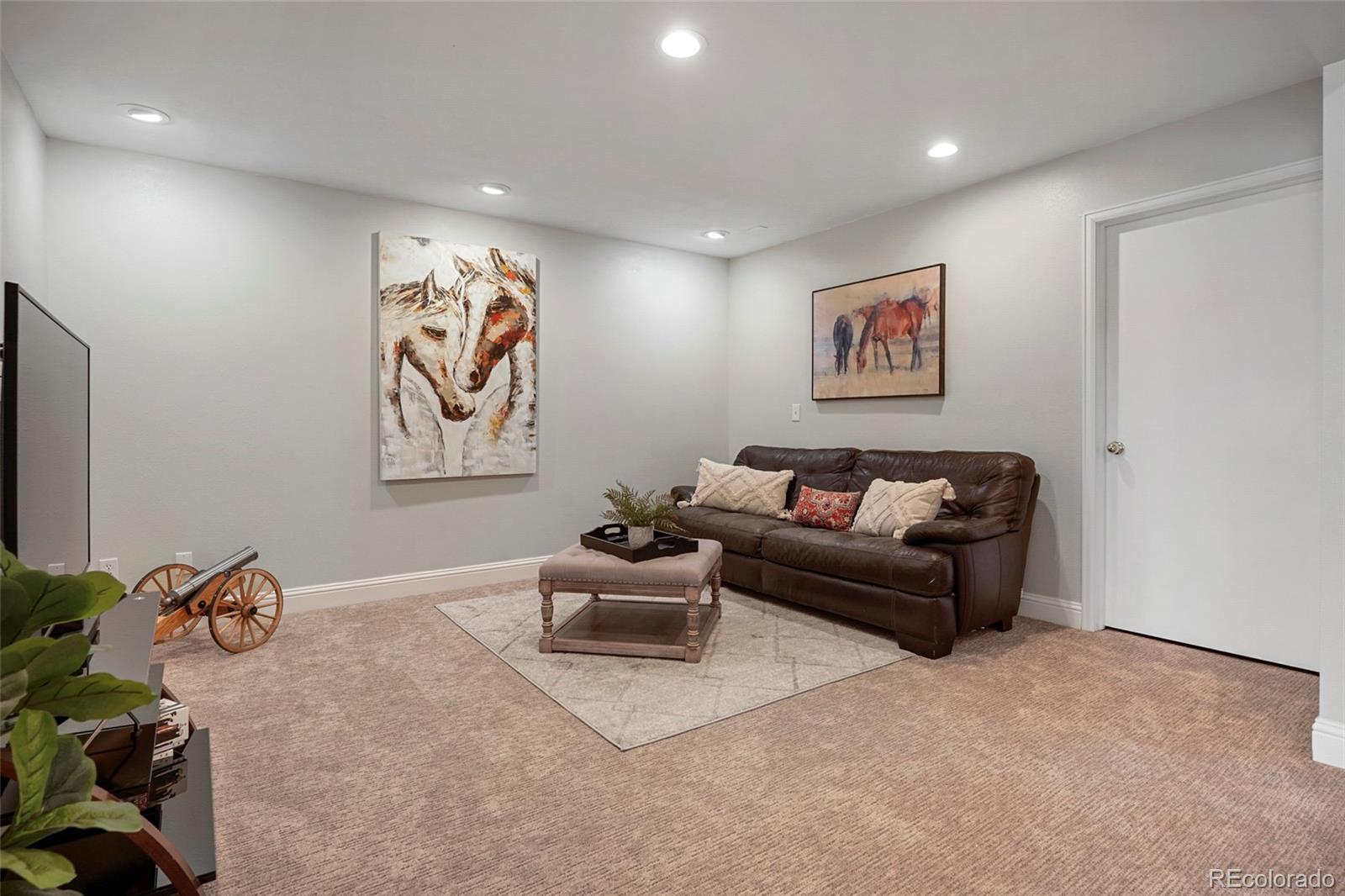 14929 South Spring Valley Road Larkspur, CO 80118 - Photo 27 of 40 a living room with furniture