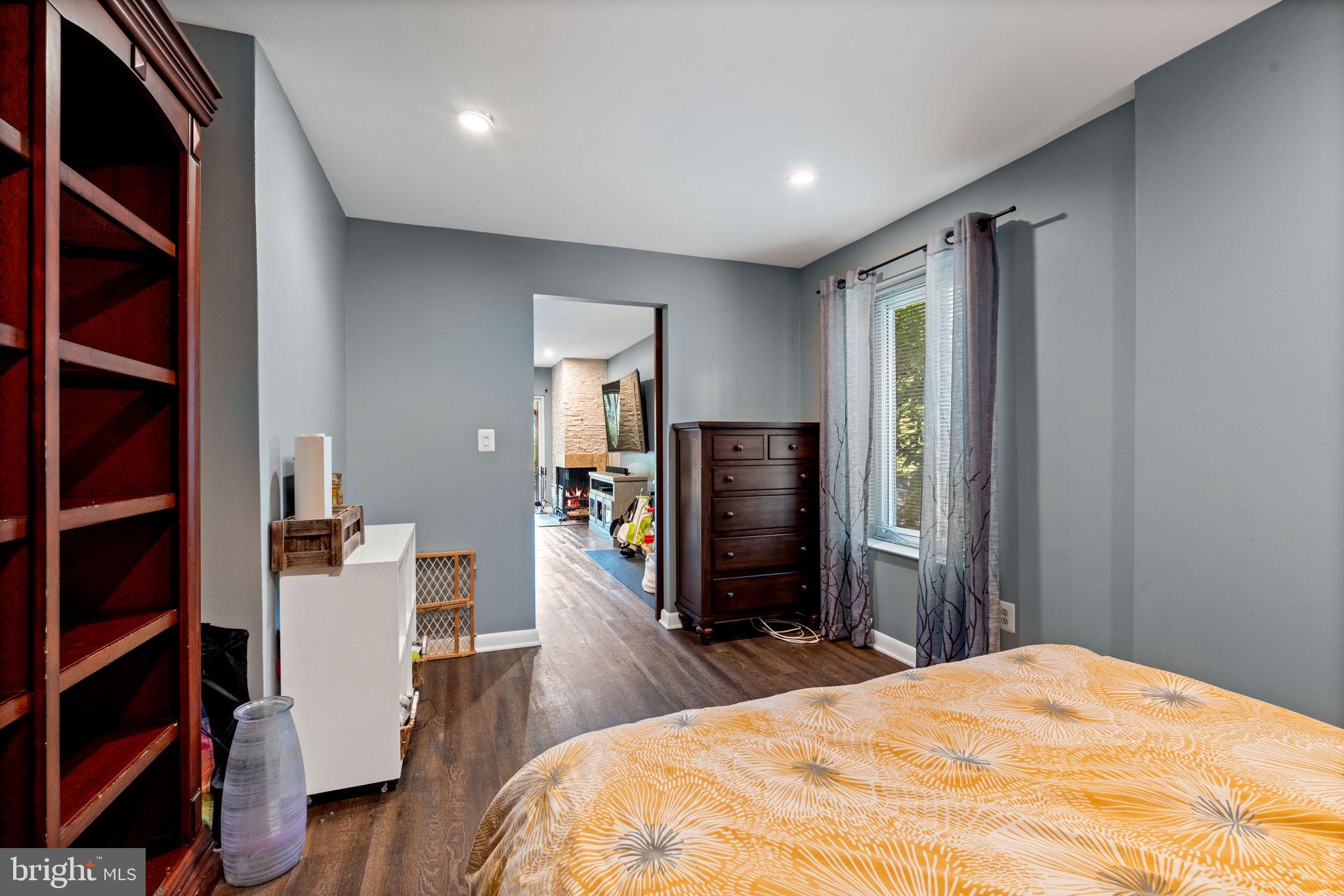 2012 Swans Neck Way Reston, VA 20191 - Photo 28 of 36 a bedroom with a bed and a television