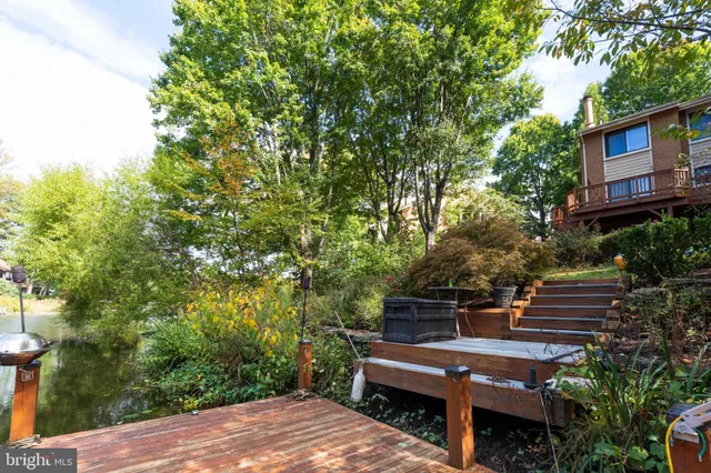 a view of a bench in a backyard