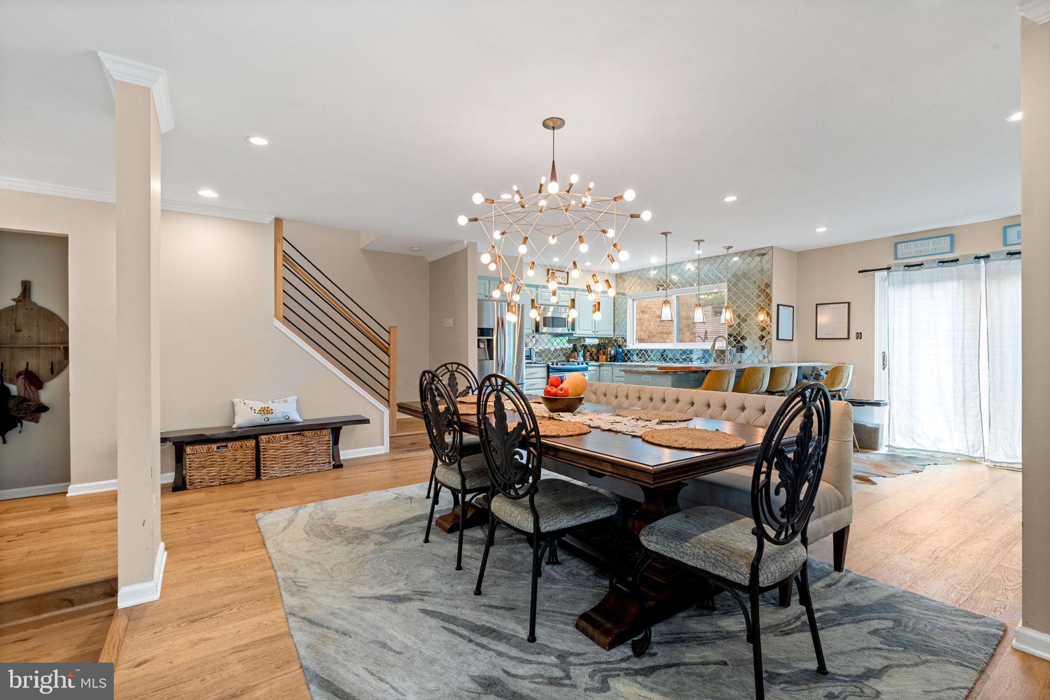 2012 Swans Neck Way Reston, VA 20191 - Photo 10 of 36 a dining room with a table or chairs and a wooden floor