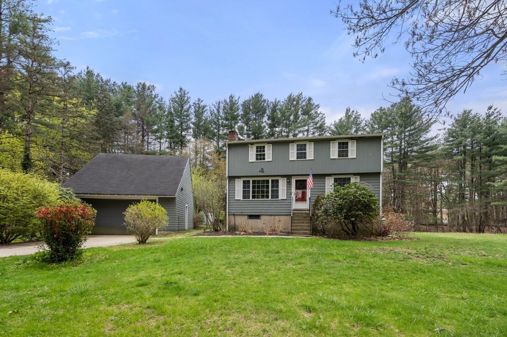 47 Stonebrook Road Sudbury, MA 01776 - Photo 1 of 17 a view of house with yard and entertaining space