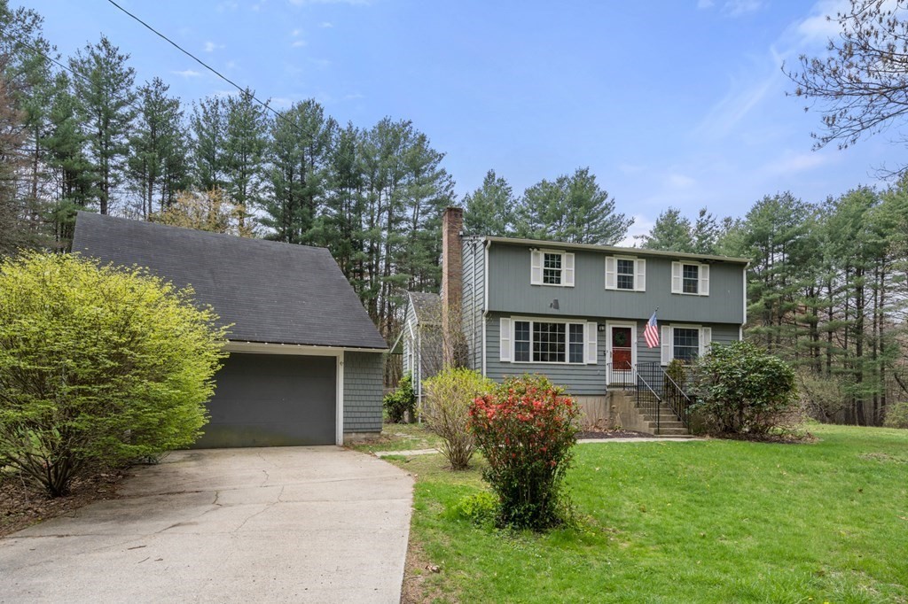 47 Stonebrook Road Sudbury, MA 01776 - Photo 2 of 17 front view of house with a yard